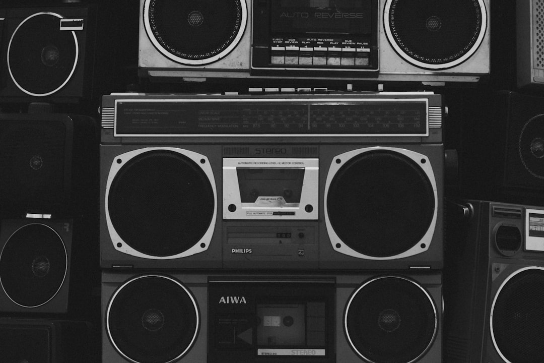 a-bunch-of-boomboxs-that-are-stacked-on-top-of-each-other-kv8n42joeue